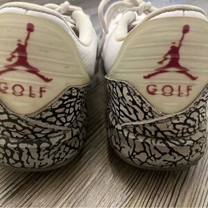 Jordan Men’s White and Red Golf Shoes with Patterned Accents